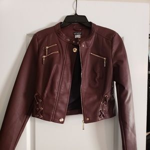 Faux leather jacket with gold embellishments